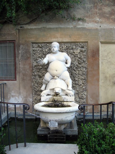Boboli Gardens-64.JPG - The statue of Cosimo I's chubby court dwarf sitting atop a turtle squats just in front of the Palazzo Pitti exit.